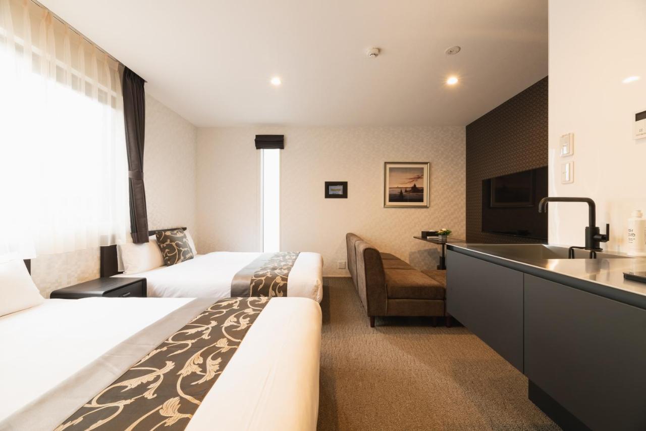 Grand Base Nagasaki Ekimae Aparthotel Exterior photo